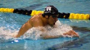 man swimming in pool