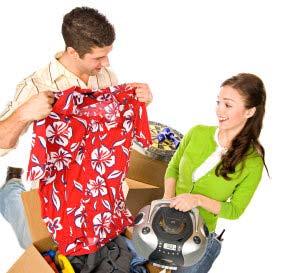 man and woman inspecting items for sale