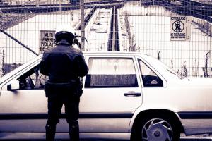 a police officer ticketing a motorist