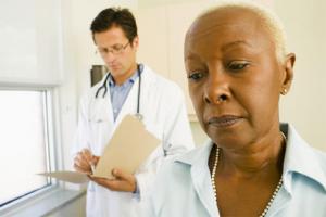 African-American woman with her doctor