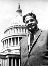 Dalip Singh Saund standing in front of U.S. Capitol