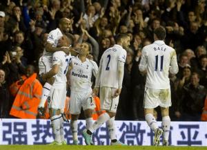 Tottenham Hotspur's Jermain Defoe, top left, celebrates with teammates